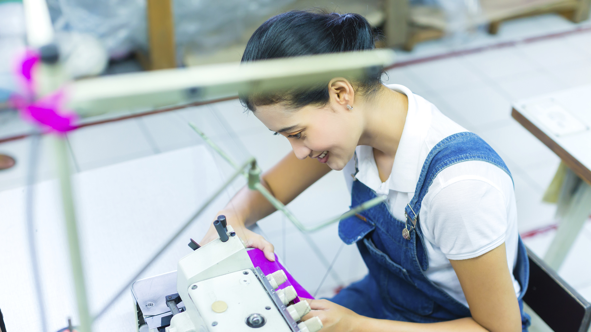 Seamstress sewing factory
