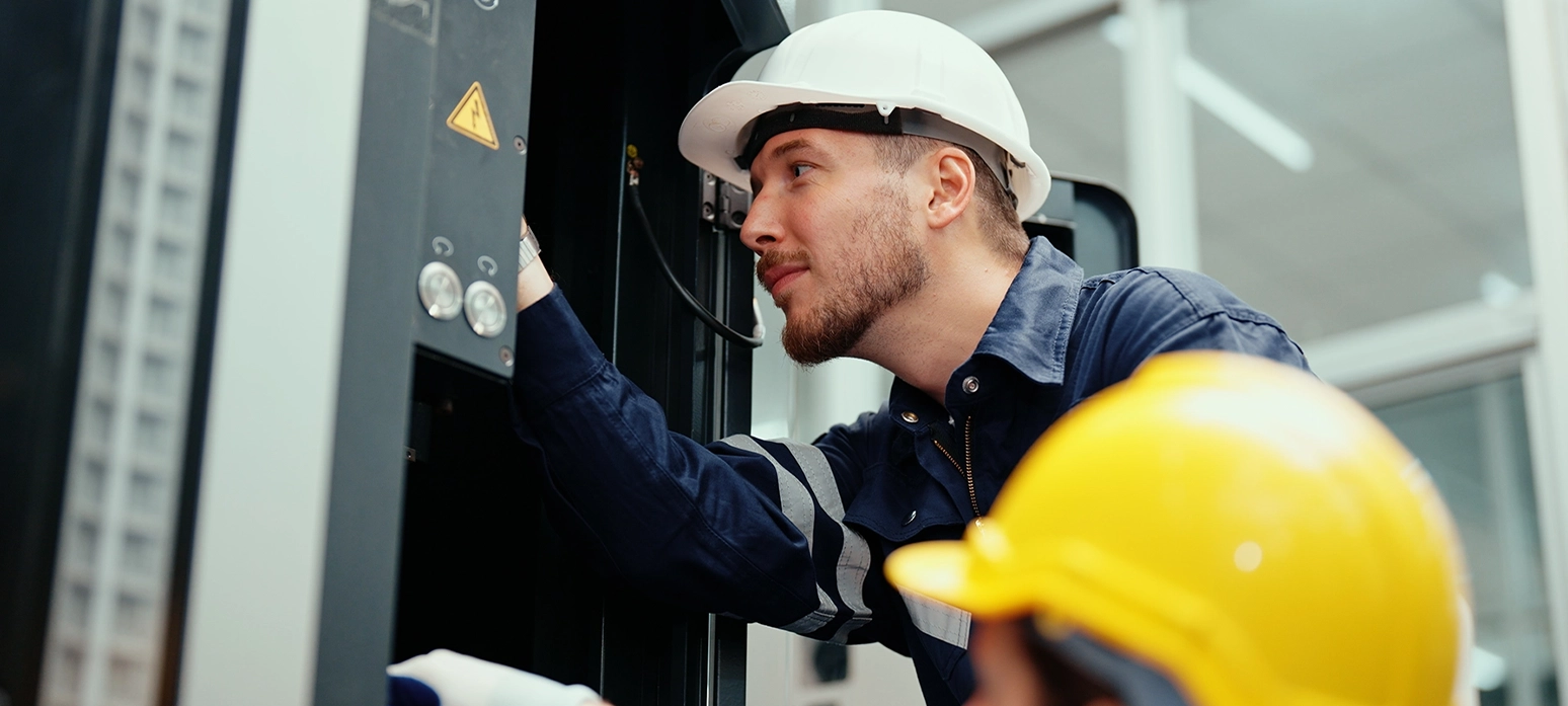 A man working on the electric circuit