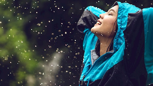 Woman getting wet in the rain