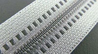 Raw white textile tape with grey spiral